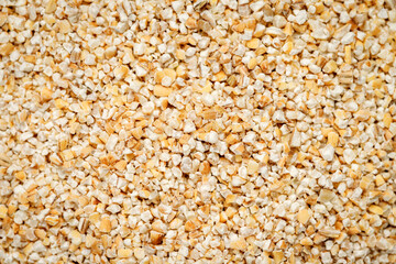 Barley groats texture background. High quality photo