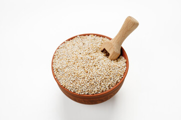 Barley groats in bowls and bags isolated on a white background. High quality photo