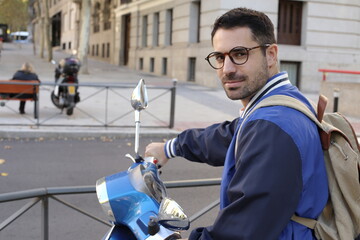 Cute guy riding a motorcycle