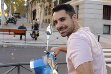 Cute guy riding a motorcycle