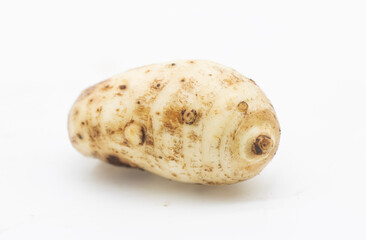 taro root on white background , Arbi vegetable