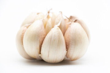 Isolated garlic. Raw garlic with segments isolated on white background, with clipping path