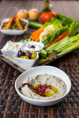 morning breakfast humus, olives, cheese and labneh with vegetables 