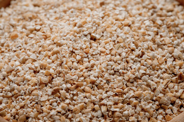 Barley groats texture background. High quality photo