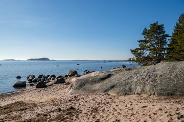 Fototapeta na wymiar View of the shore and Gulf of Finland in spring, Furuvik nature preserve area, Hanko, Finland