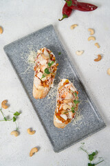 Pumpkin and goat's cheese bruschetta on a plate