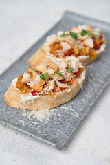 Pumpkin and goat's cheese bruschetta on a plate