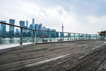 Fototapeta premium Urban modern commercial buildings and space platforms - background pictures of automobile advertisements