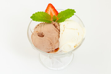 chocolate and vanilla ice cream scoops in bowl