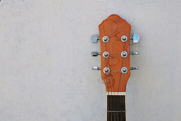 guitar on old wall, copy spaced,vintage tone.