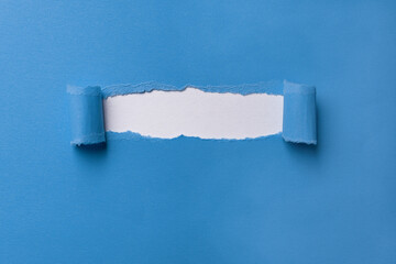 background with blue paper, paper curl