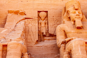 Statue of seated pharaoh Ramesses II and Ra Horakhty at The Great Temple of Rameses II.