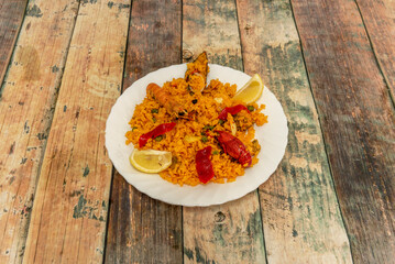Paella, rice-based cooking recipe, originating in the current Valencian Community, today very popular throughout Spain and served in restaurants around the world.