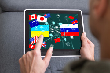 country flags and Ukrainian and Russian flag on the tablet