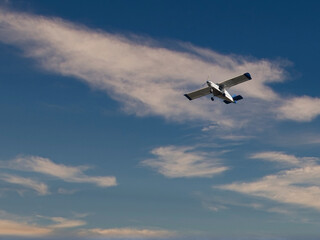 Fototapeta na wymiar detail of little plane in the sky