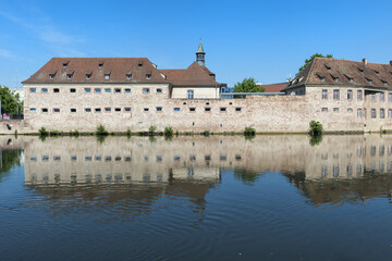 Fototapeta na wymiar National School of Administration or ENA along the ILL Canal, Strasbourg, Alsace, Bas-Rhin Department, France