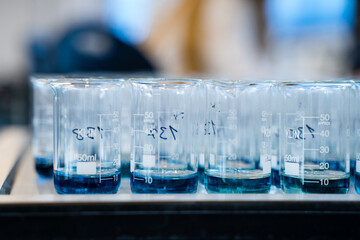 Laboratory for analysis of flasks with blue liquid a lot