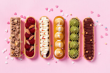 Delightful set of eclairs with pistachio raspberries and chocolate