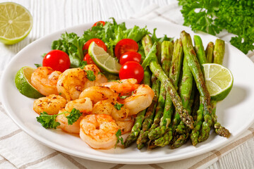 toasty asparagus with fried prawns, lime and salad