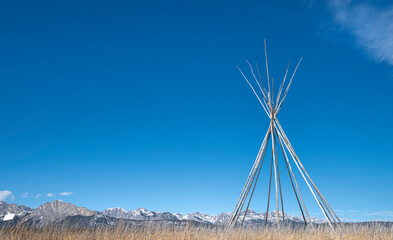 Teepee frame on the Stoney Indian Reserve near Morley, Alberta, Canada © jkgabbert