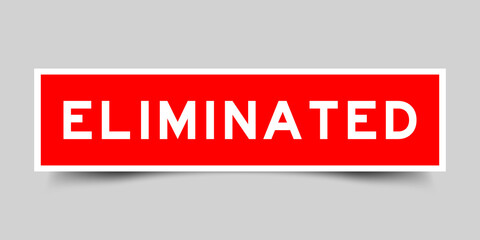 Sticker label with word eliminated in red color on gray background