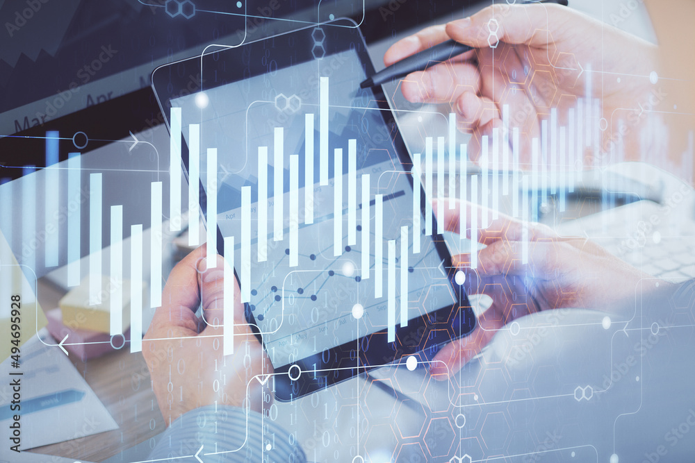 Poster double exposure of man's hands holding and using a phone and financial chart drawing. market analysi