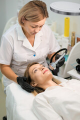 Fototapeta na wymiar Electroporation procedure close-up. Girl on a cosmetic procedure