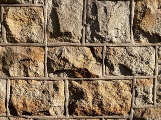 a sand-lime brick wall made of rectangular bricks with irregular surface