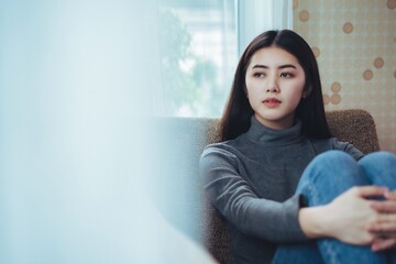 unhappy woman sit alone feeling bad , Emotional girl depressed, copy space vintage tone style.