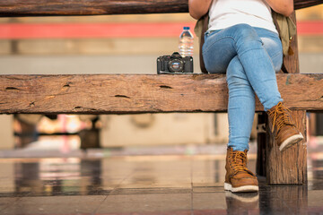 asian beautiful girl tourist travel taking photo city street, journey backpack adventure by train concept.