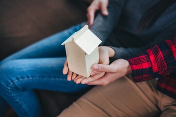 Asian couple buys a house.
