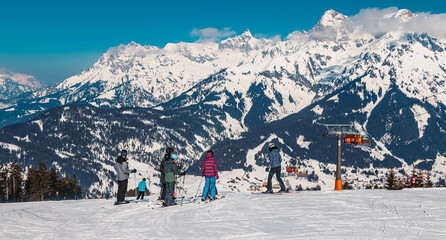 Beautiful alpine winter landscape shot with ski drivers at Maria Alm, Salzburg, Austria