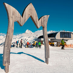 Beautiful alpine winter landscape with details of a wooden logo at Maria Alm, Salzburg, Austria