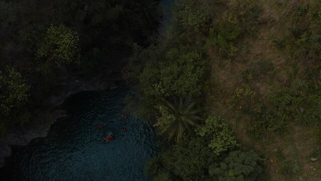 Aerial view of a river in between the mountains 