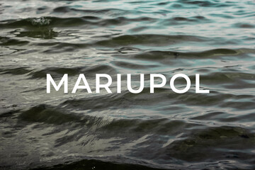 Save Mariupol. Dramatic seascape with ocean wave. View of stormy dark sea. Surface of water background Selective focus