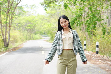 Asian woman tourists smile happily.