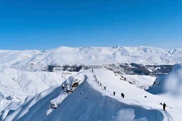 skiing in the mountains