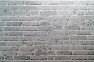 White brick wall texture background made by pattern paper. Wall texture background flooring rock stone old pattern clean concrete grid uneven bricks design stack. Background for the wall in LOFT style