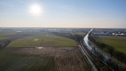 canal Dessel Schoten aerial photo in Rijkevorsel, kempen, Belgium, showing the waterway in the natural green agricultural landscape. High quality photo. High quality photo