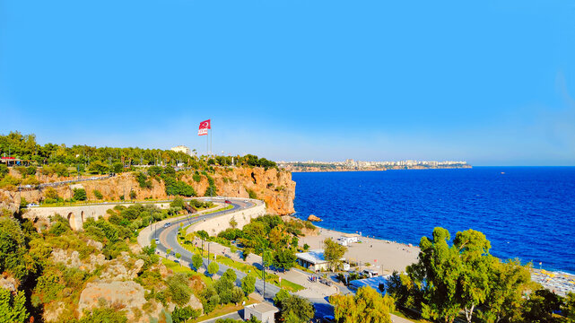 Antalya, Konyaaltı beach with Turkish flag