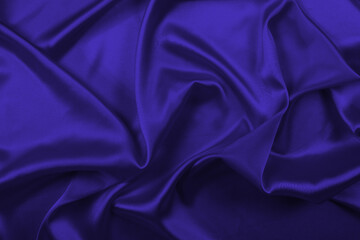Violet silk or satin luxury fabric texture.