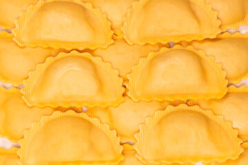 Raw ravioli as background. Healthy italian food.