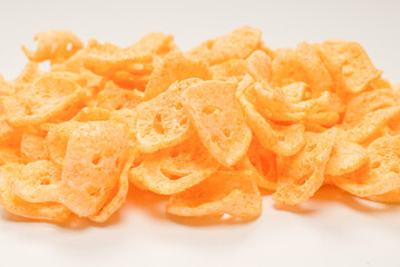 Crispy salted snacks on white background.