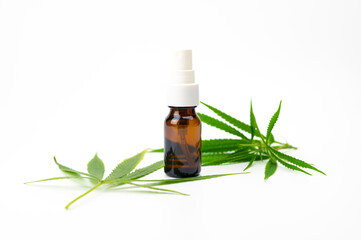 cannabis oil extract in a bottle , hemp oil marijuana leaves isolated on white background, herbal medicine and health care concept