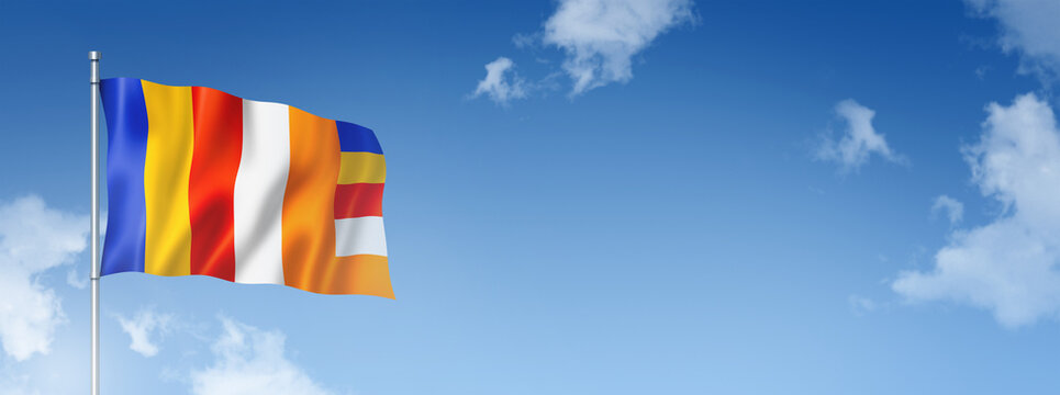 Buddhism flag isolated on a blue sky. Horizontal banner