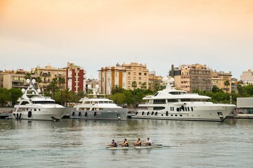 Rowers in Europe with Yachts © John