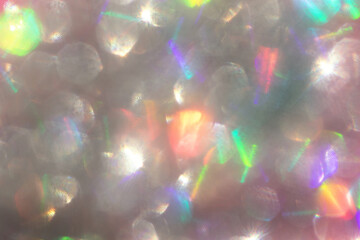 Abstract defocused silver background with shining glitter.Good as overlay layer.Abstract defocused...