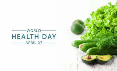 World Health day concept. Mix of green vegetables on white background.