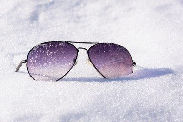 Sunglasses in the cold, in the snow.