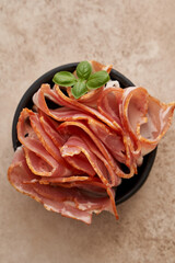 bacon - ingredients for carbonara pasta on a beige background